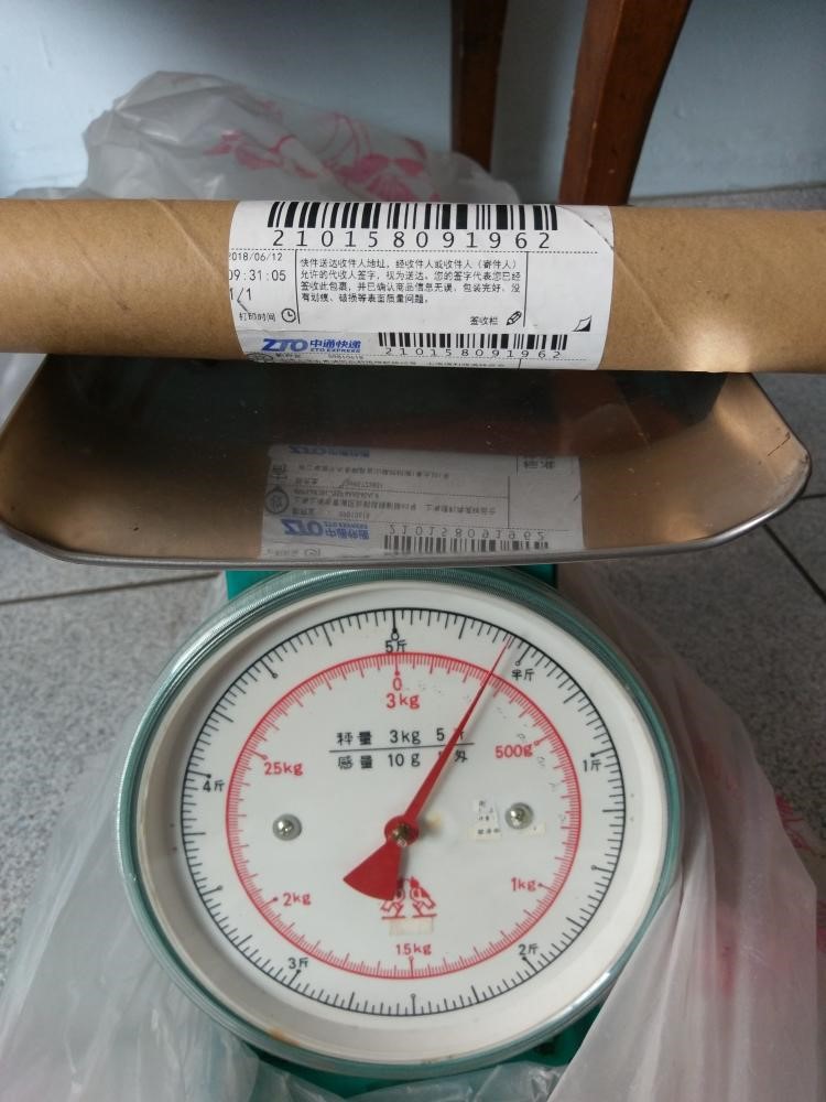 包裹重量不符 ①举证还原称重图片:把包裹的外包装置于底层,第二层